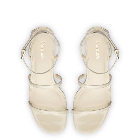 Gio Sandal In Ivory Patent Leather